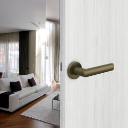 Deurkruk Luce op rond rozet - mat brons